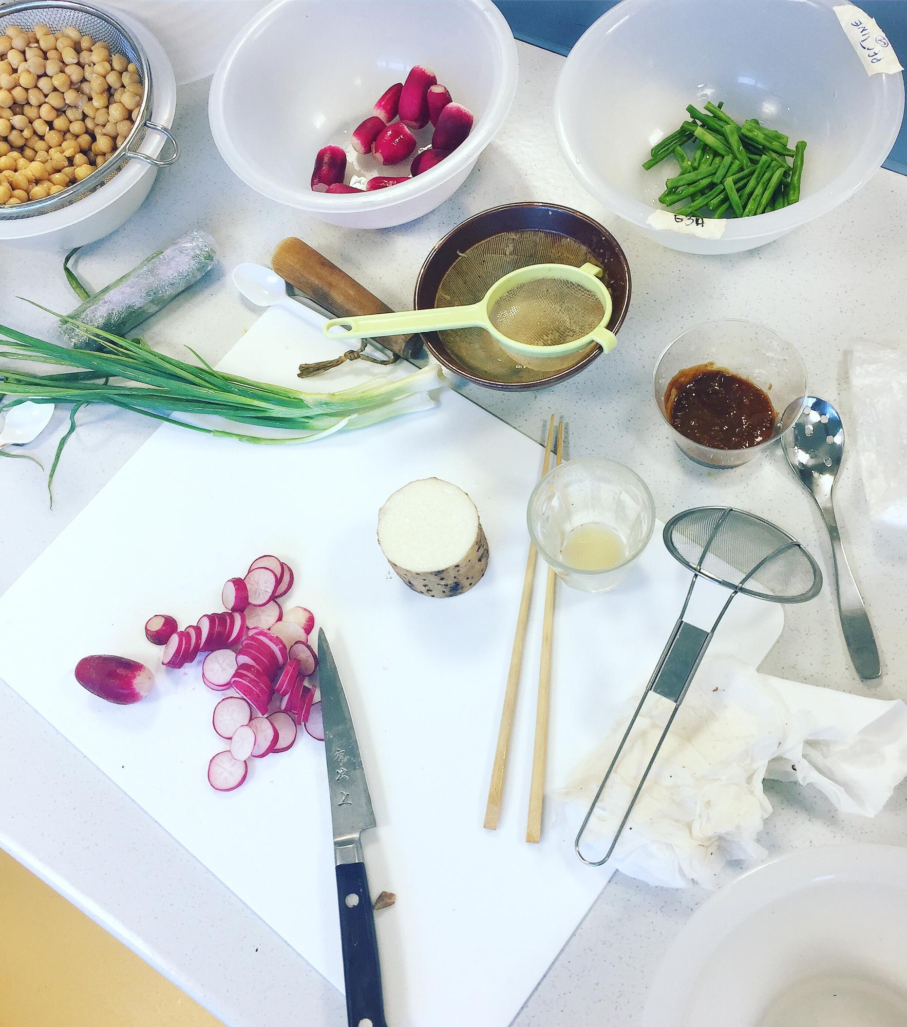 Workshop table with curated ingredients and tools